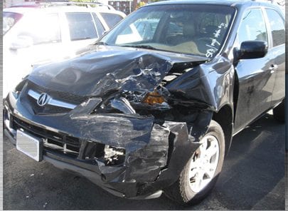 Picture of car with the front completely totaled