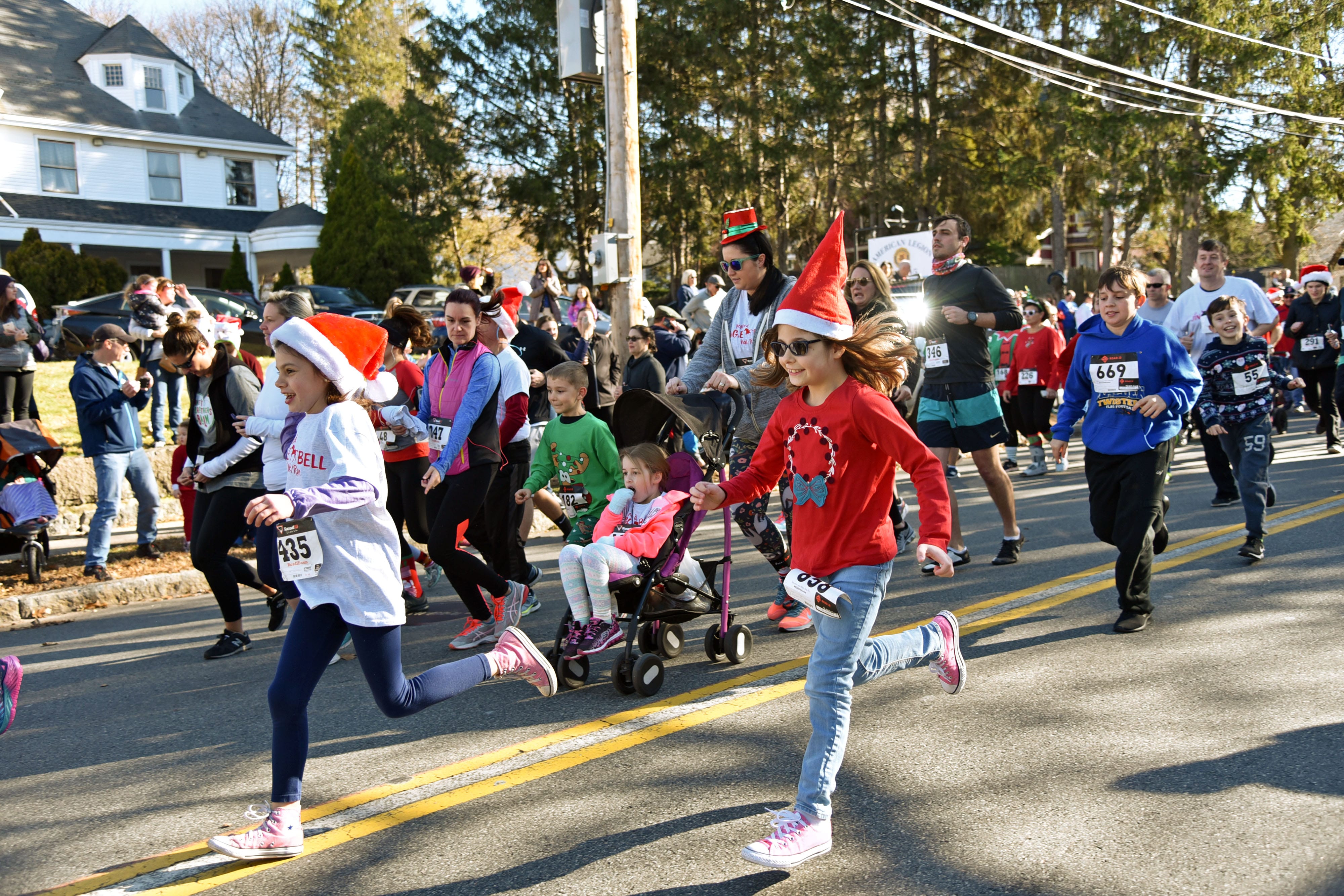 Hundreds of families and friends participated in the fifth annual Jingle Bell 5K Run/Walk on November 25 to raise money for Medford schools.