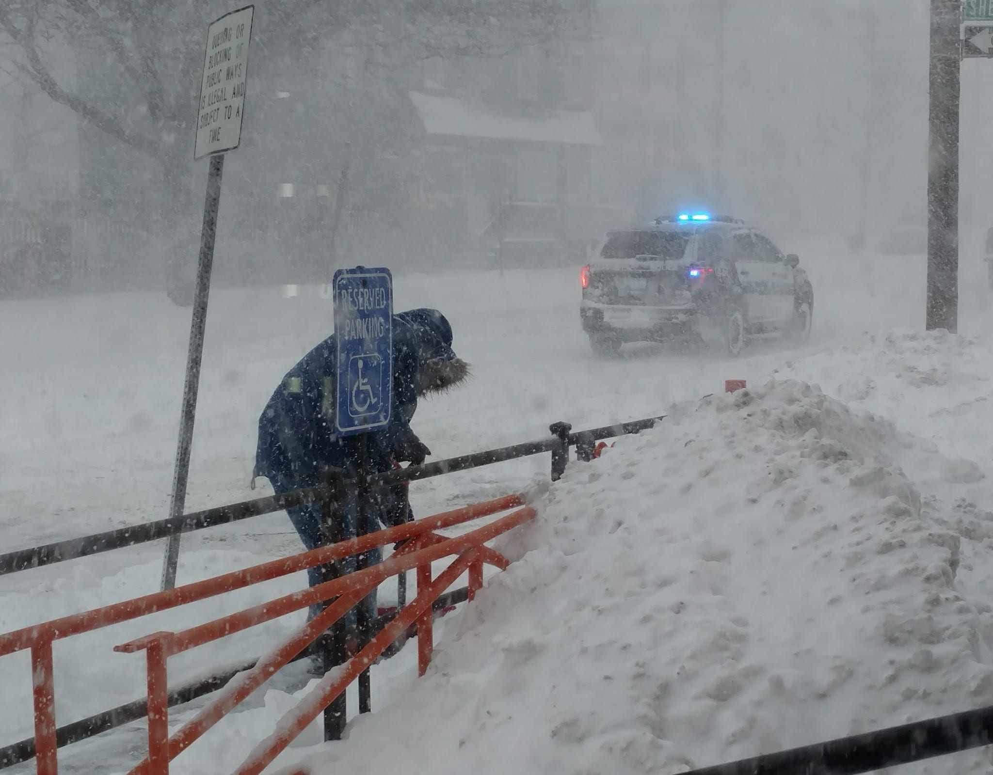 Heavy winds and snow caused near white-out conditions in Peabody near noon as most traffic was off the streets except for plows and police.