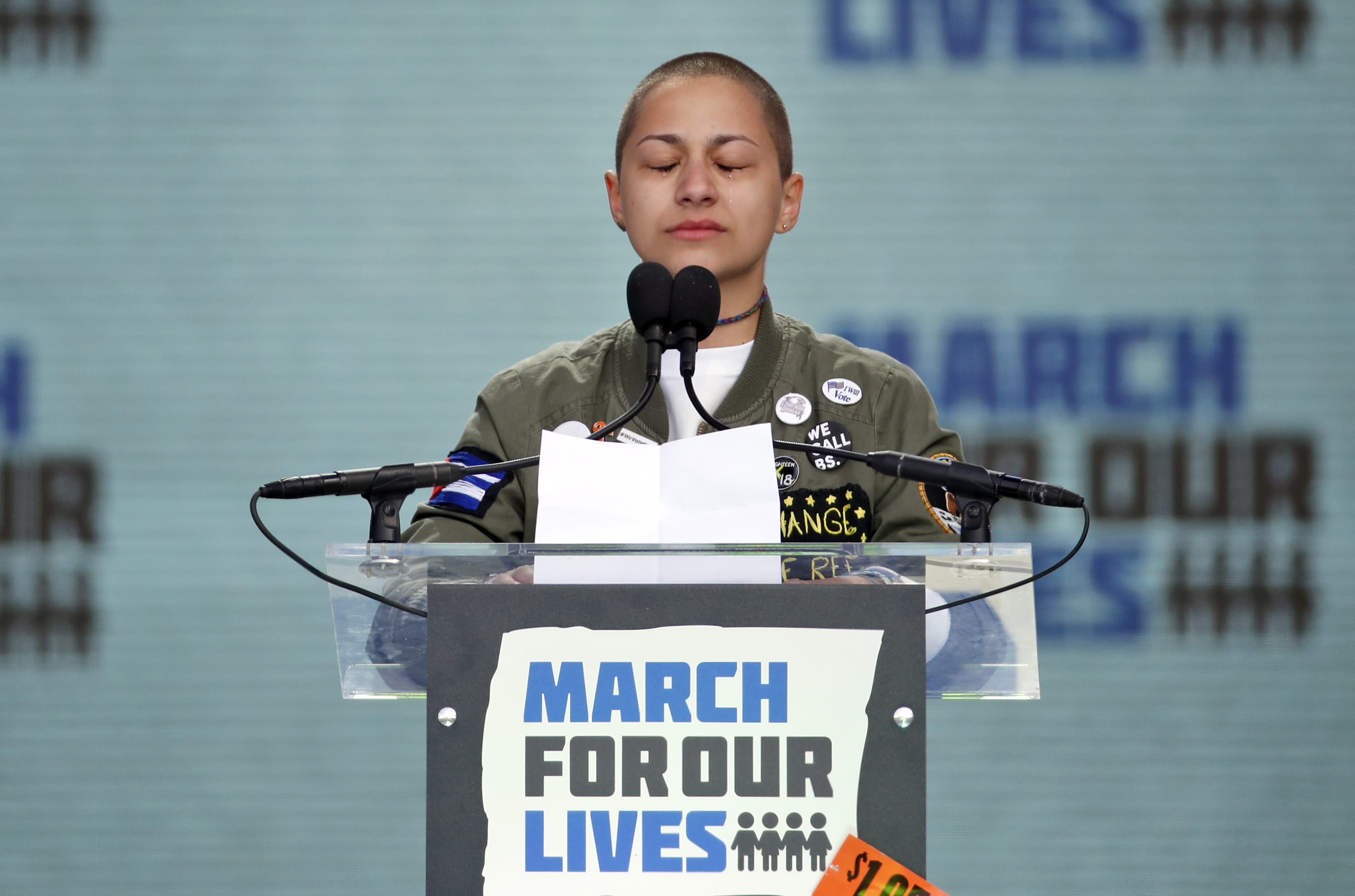 Emma Gonzalez, a survivor of the mass shooting at Marjory Stoneman Douglas High School in Parkland, Fla., closes her eyes and cries as she stands silently at the podium for the amount of time it took the Parkland shooter to go on his killing spree during the 