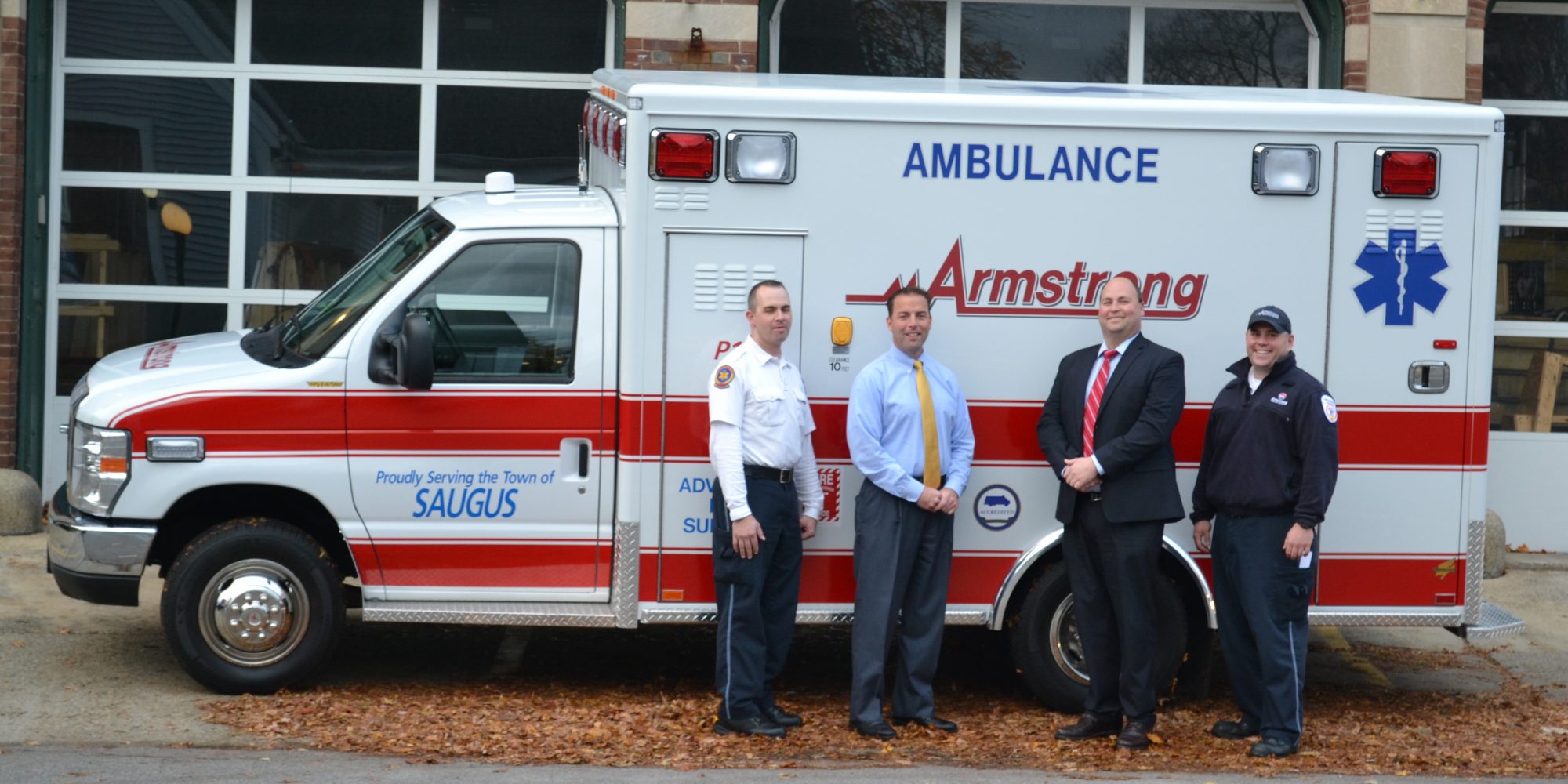 Armstrong Ambulance Paramedic Wayne Gilbert, Armstrong Ambulance CEO Richard Raymond, Town Manager Scott Crabtree, and Armstrong Ambulance Paramedic Chris Stirling.