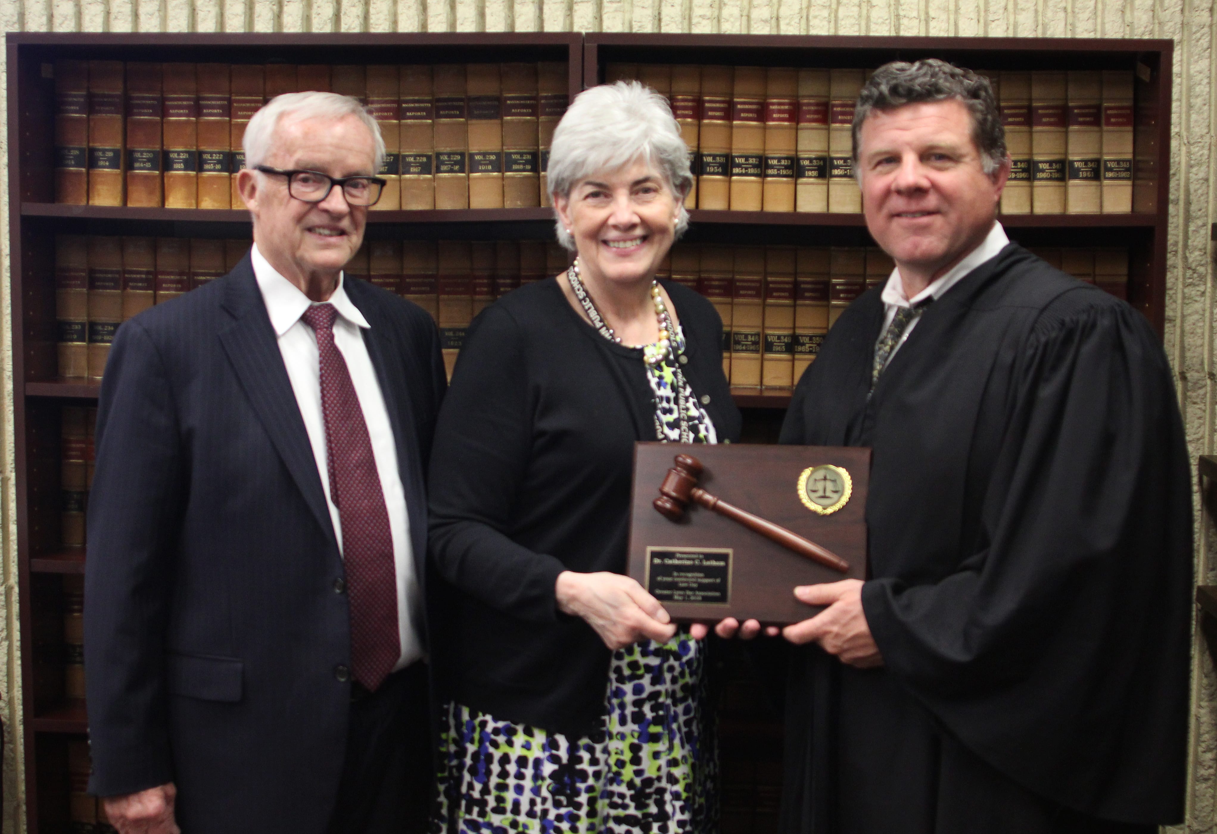 Lynn,Ma. 5-7-18. Attorney Jim Carrigan, Superintendent of Lynn Schools Dr. Catherine C. Latham and Judge Matthew Nestor present Latham with a thank you gavel for her support of Law Day for the past ten years. The gavel is from the Greater Lynn Bar Association.