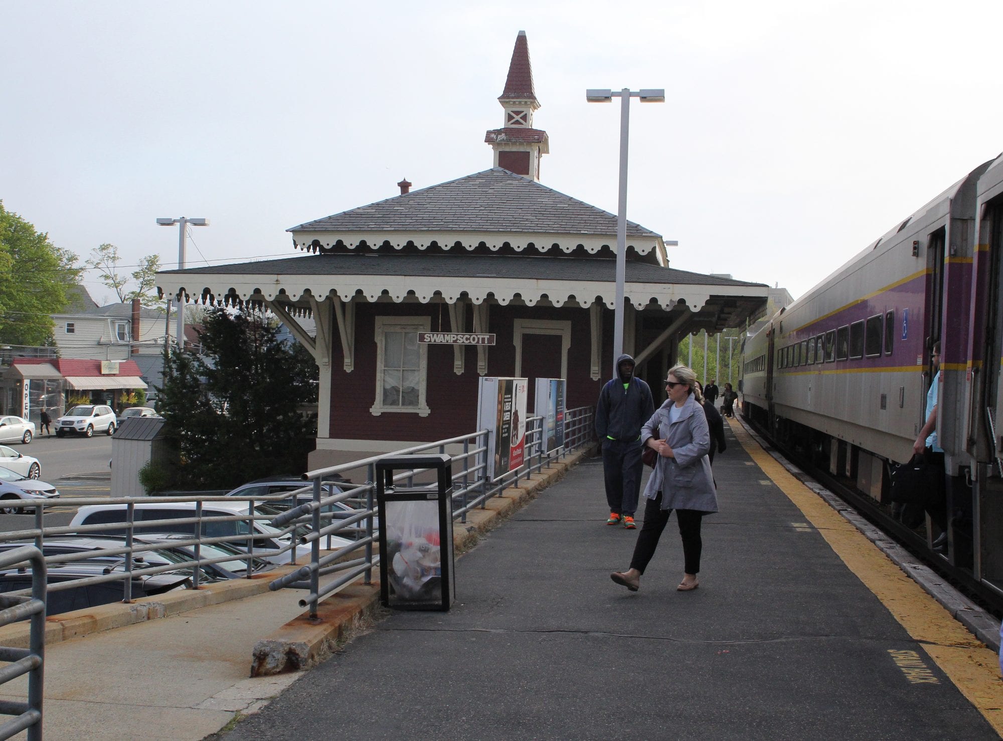 Passengers board and depart a commuter rail train in Swampscott.