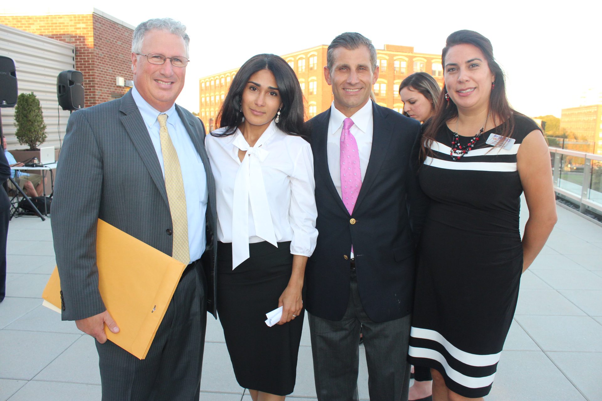 Mayor Thomas McGee, Saritin Rizzuto, Taso Nikolakopoulos, and Diana Moreno.