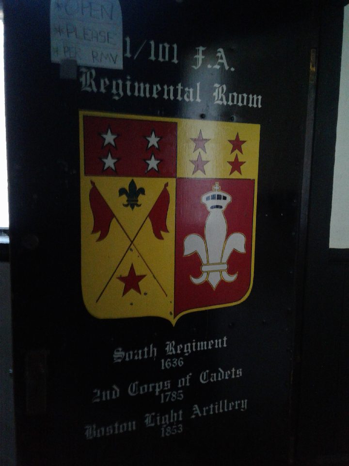 A door in the Lynn Armory displays the lineage of National Guard units based in the South Common Street facility.