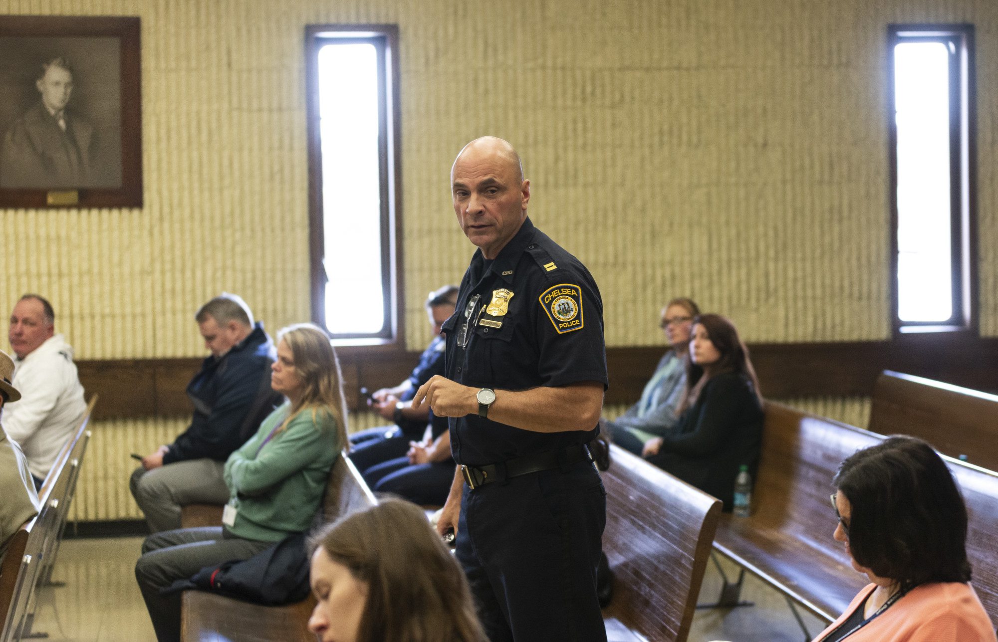 Chelsea Police Captain Dave Batchelor teaches the crowd gathered in Courtroom 2 of Lynn District Court about the Hub model on Wednesday.