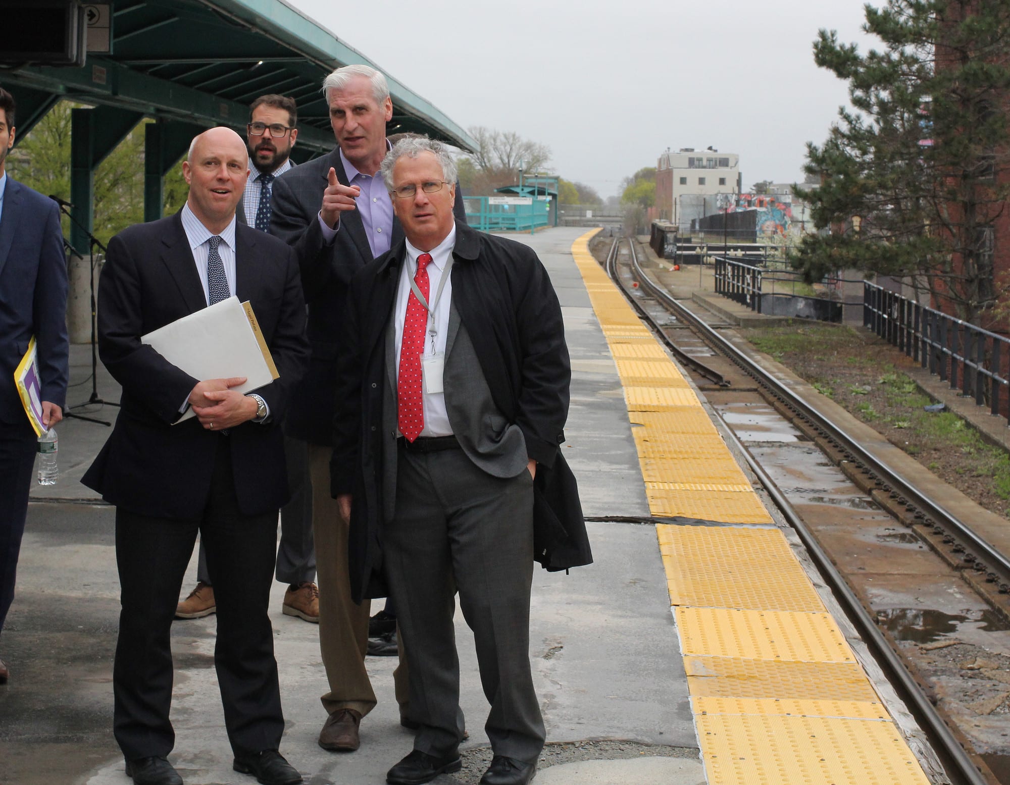 Lynn, Ma. 4-26-19. Joe Mulligan and Mayor Thomas McGee giving Secretary of the Executive Office of Housing and Economic Development Mike Kennealy a tour of Lynn that included the train platform.