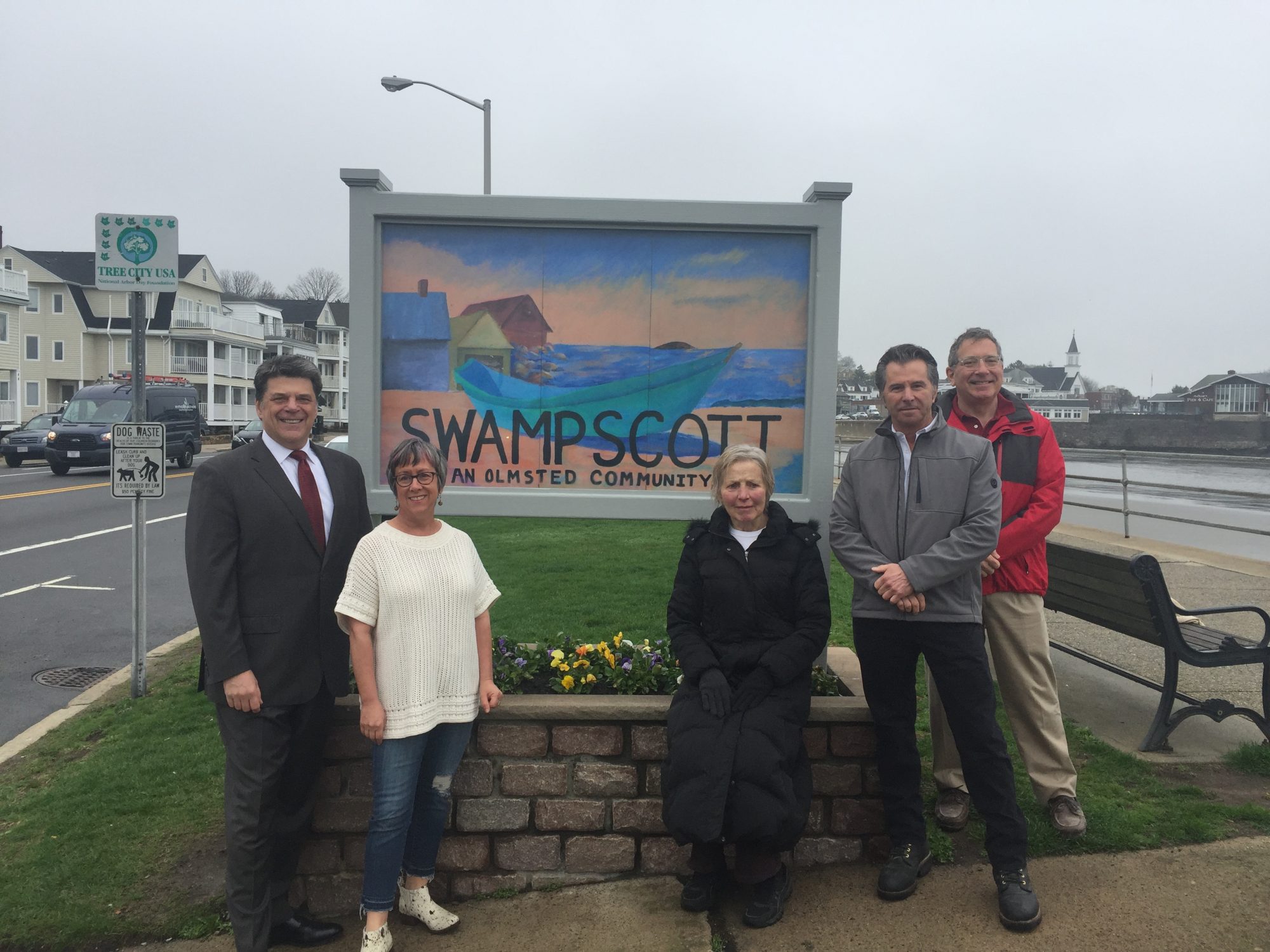 For the last five years, a Welcome to Swampscott sign has been absent. Selectman Don Hause, Jackie Kinney, of ReachArts, Anita Balliro, artist and former high school art teacher, Bruce Paradise, of Paradise Construction, and David Shear, of ReachArts unveiled the new sign Wednesday morning.