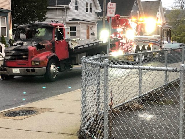 The remains of a tow truck from Bill Woods Towing Service following Thursday morning's arson.