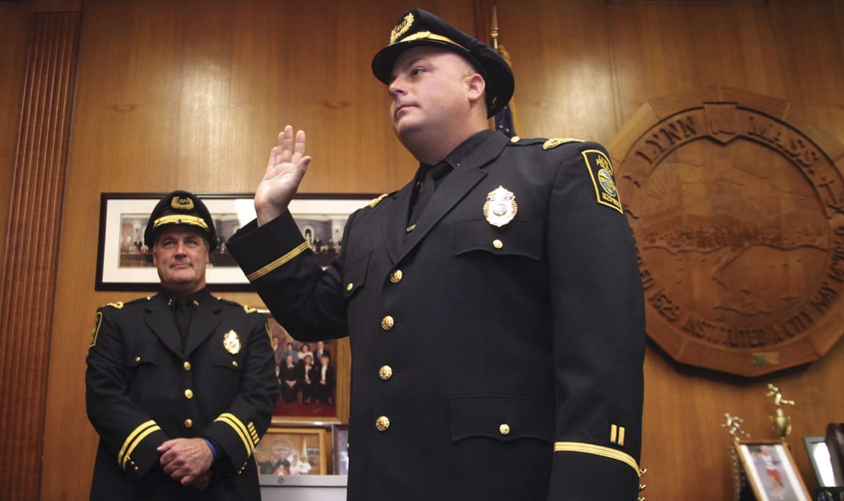 Christopher Reddy (front) has been named the new police chief of Lynn ...