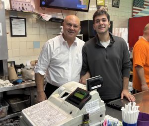 Owner of Brother's Deli, George Markos, and his nephew Peter Glavas on Thanksgiving Day.