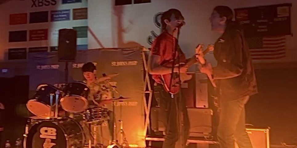 Maroon Sunrize performing on stage at St. John's Prep's Fall Dance on Friday